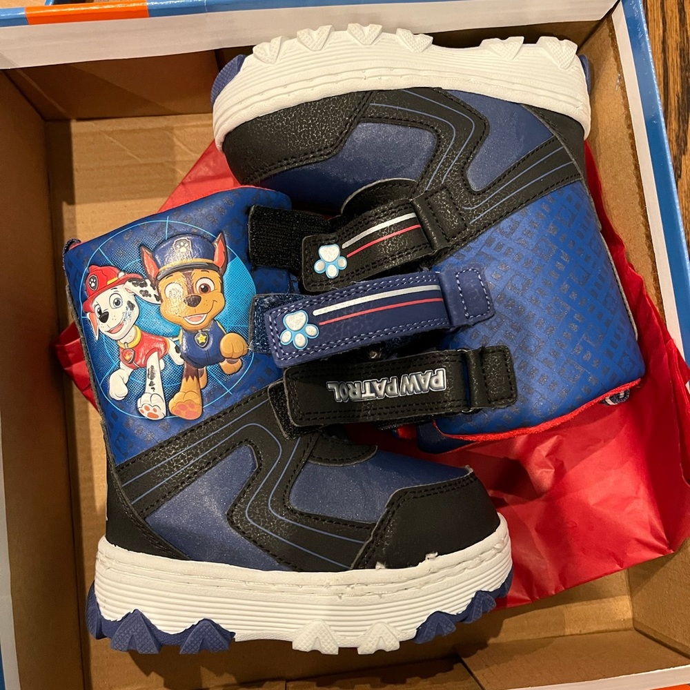 Children’s paw patrol snow boots. Never been worn, still in the box.